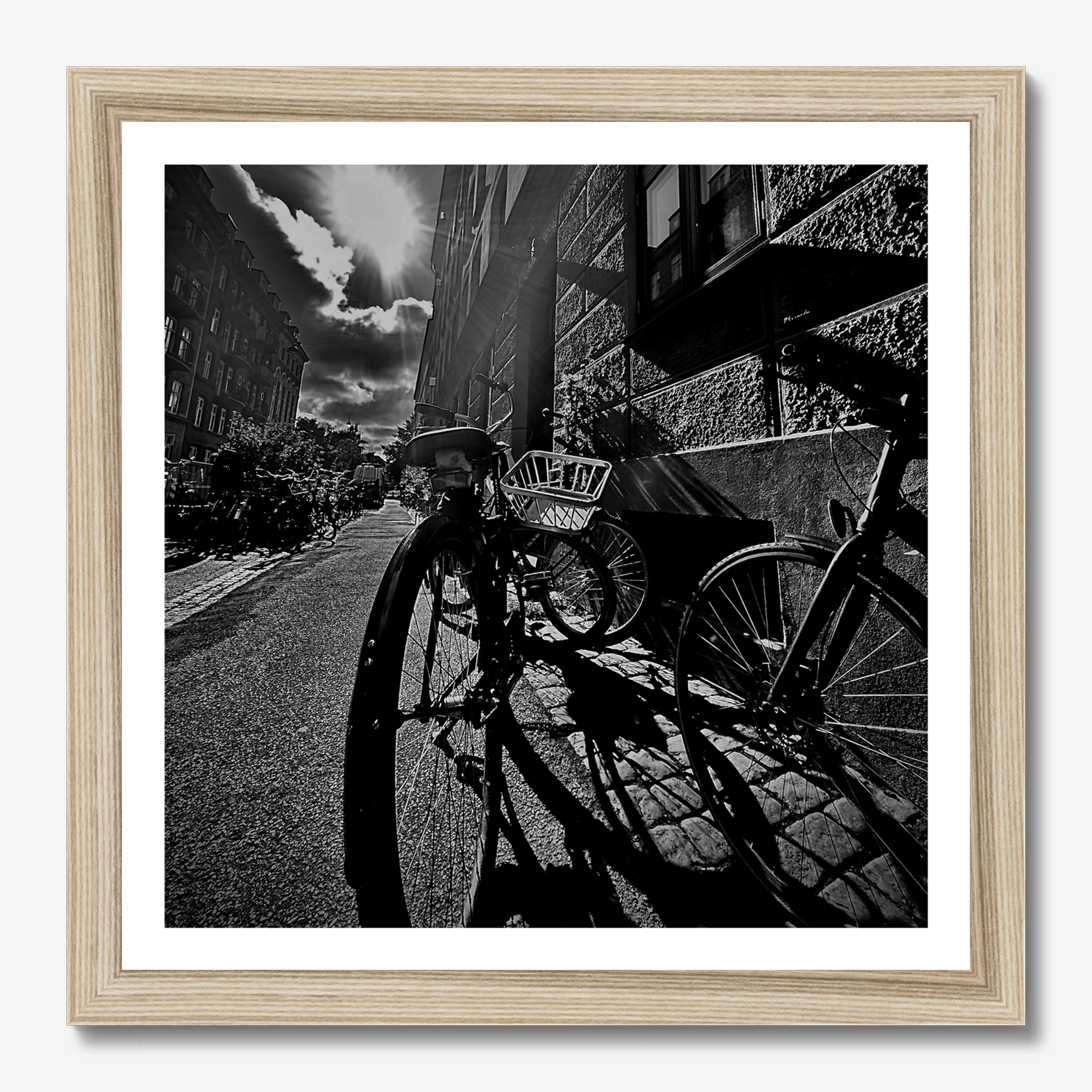 Square photography framed wall art titled 'Bike' by Sunday Morning. Premium Giclée print.