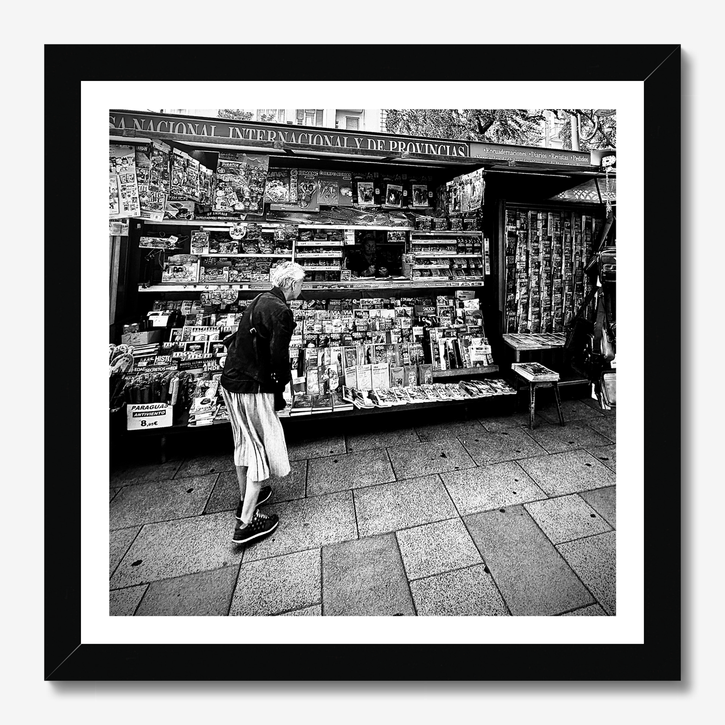 Square photography framed wall art titled 'Old News' by Sunday Morning. Premium Giclée print.