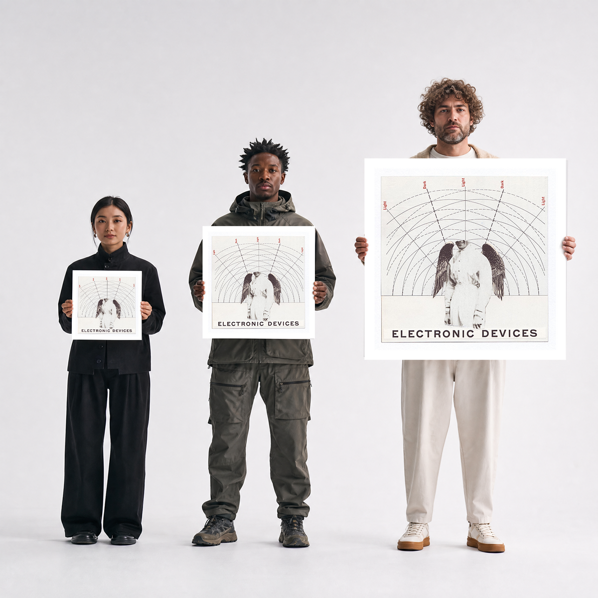 Scale comparison photo showing the 12x12, 20x20, and 40x40 print sizes of 'Devices' by Sunday Morning, held by three models for size reference.